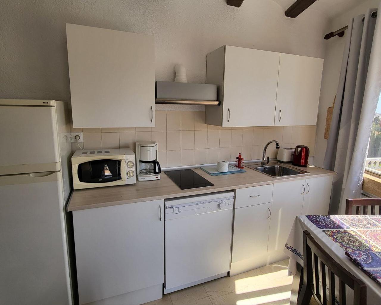 Apartamentos El Tosal 7E カルプ エクステリア 写真
